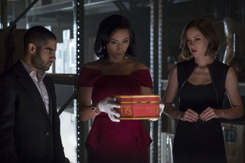 Davos, Joy, and Mika are up to no good. You can tell because they’re wearing fancy clothes in a darkly-lit warehouse.